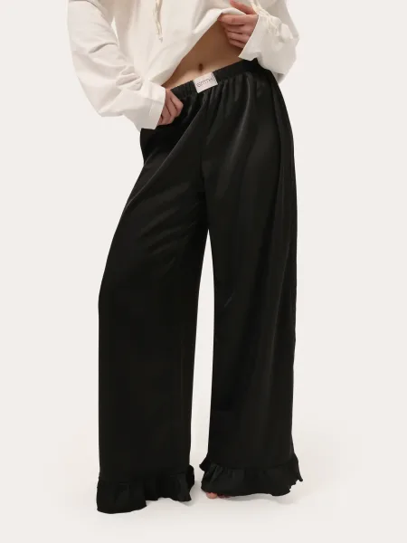 Pantalon noir à volants