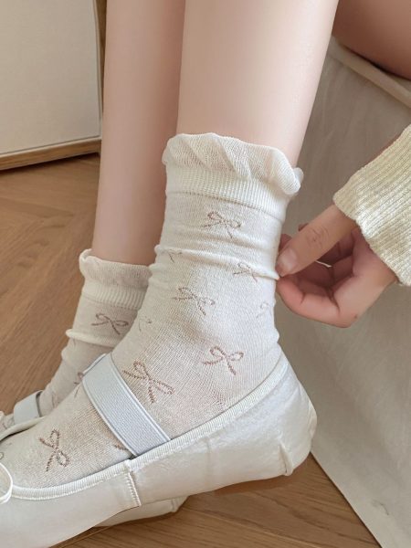 Chaussettes crème pour femmes avec des nœuds