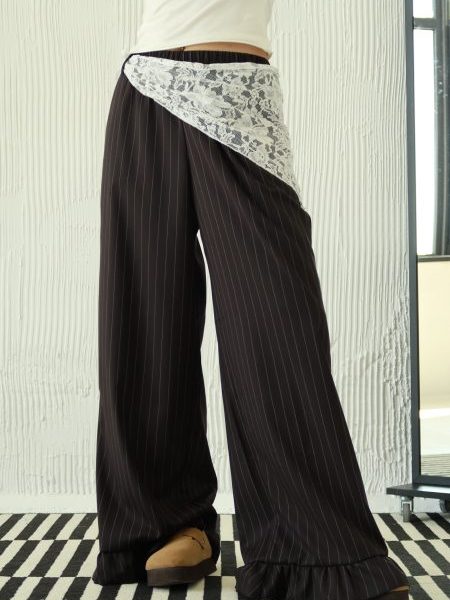 Pantalon noir à rayures avec volants