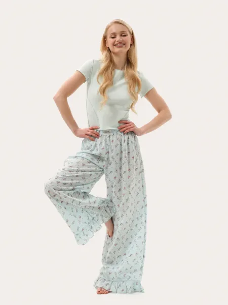 Pantalon d'été léger menthe avec volants fleuris