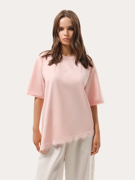 T-shirt rose avec bas asymétrique en dentelle