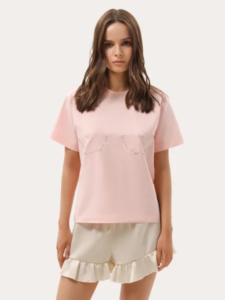 T-shirt rose avec broderie sur la poitrine