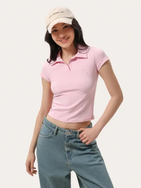 Polo rose ajusté